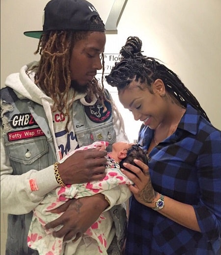 A picture of Fetty Wap and Masika Kalysha with their daughter.